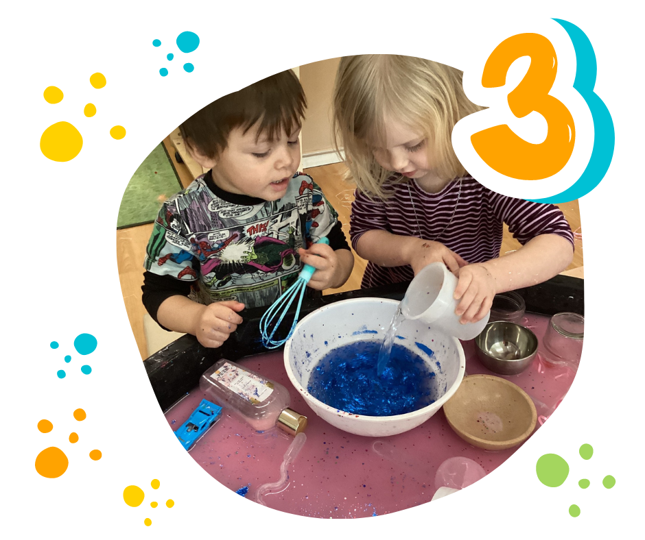 two children mixing water with other materials