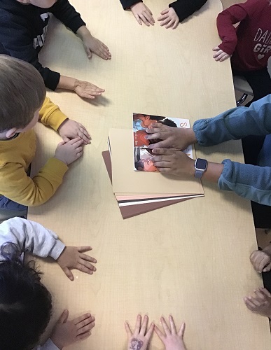 Preschool children looking at skin tones