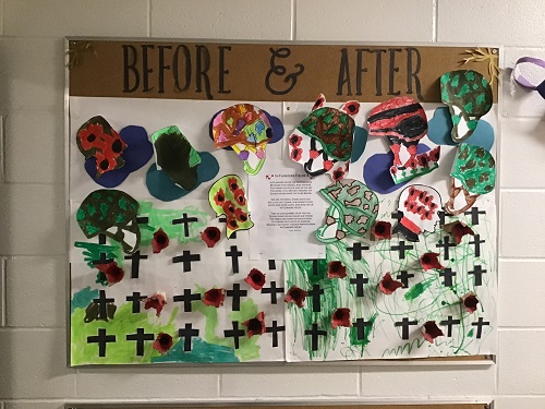 Bulletin board showcasing children's Remembrance Day artwork