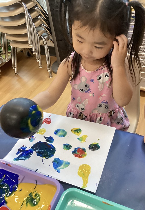 Preschool children looking at a pond