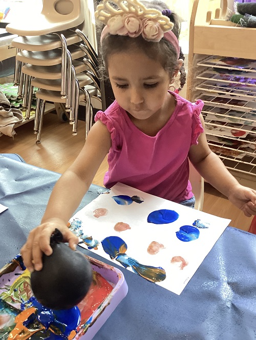 preschool children inside a fort
