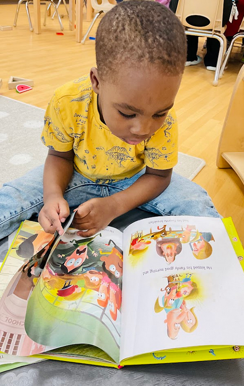 child reading a book