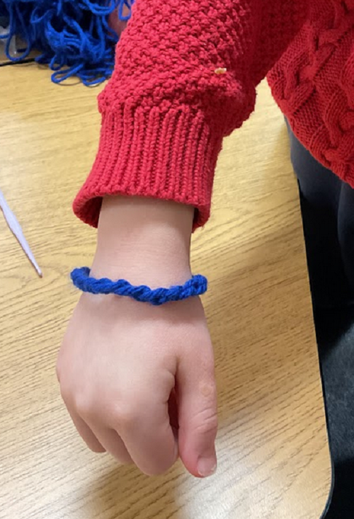 child with bracelet