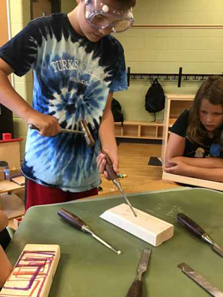 older children using a chisel