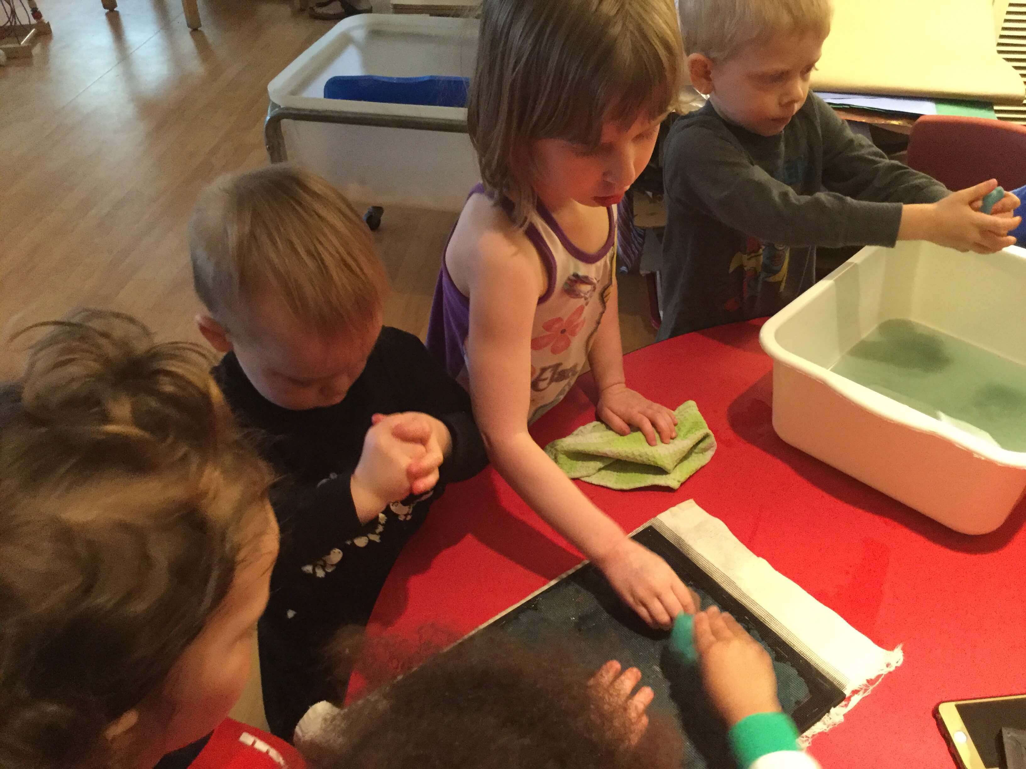 washing out items in a bin