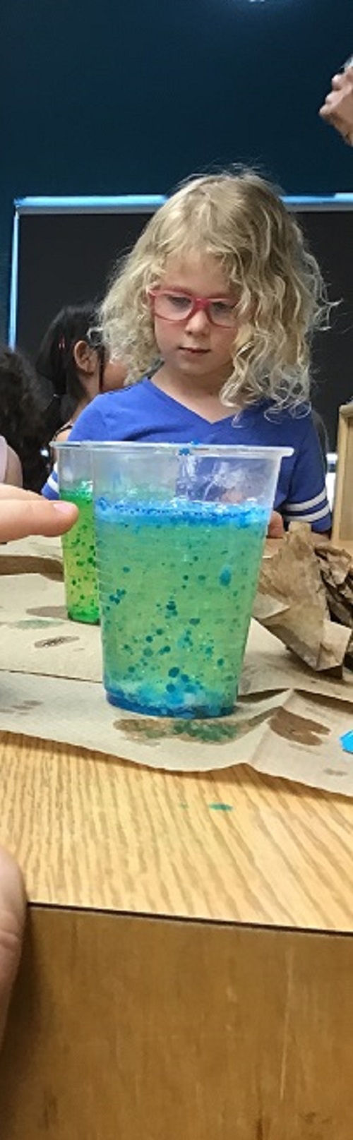 A child watching the lava lamp work
