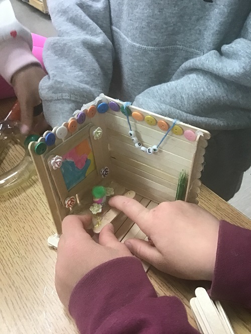 building a house with popsicle sticks