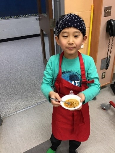 child serving food