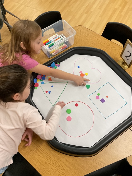 2 children at tuff tray