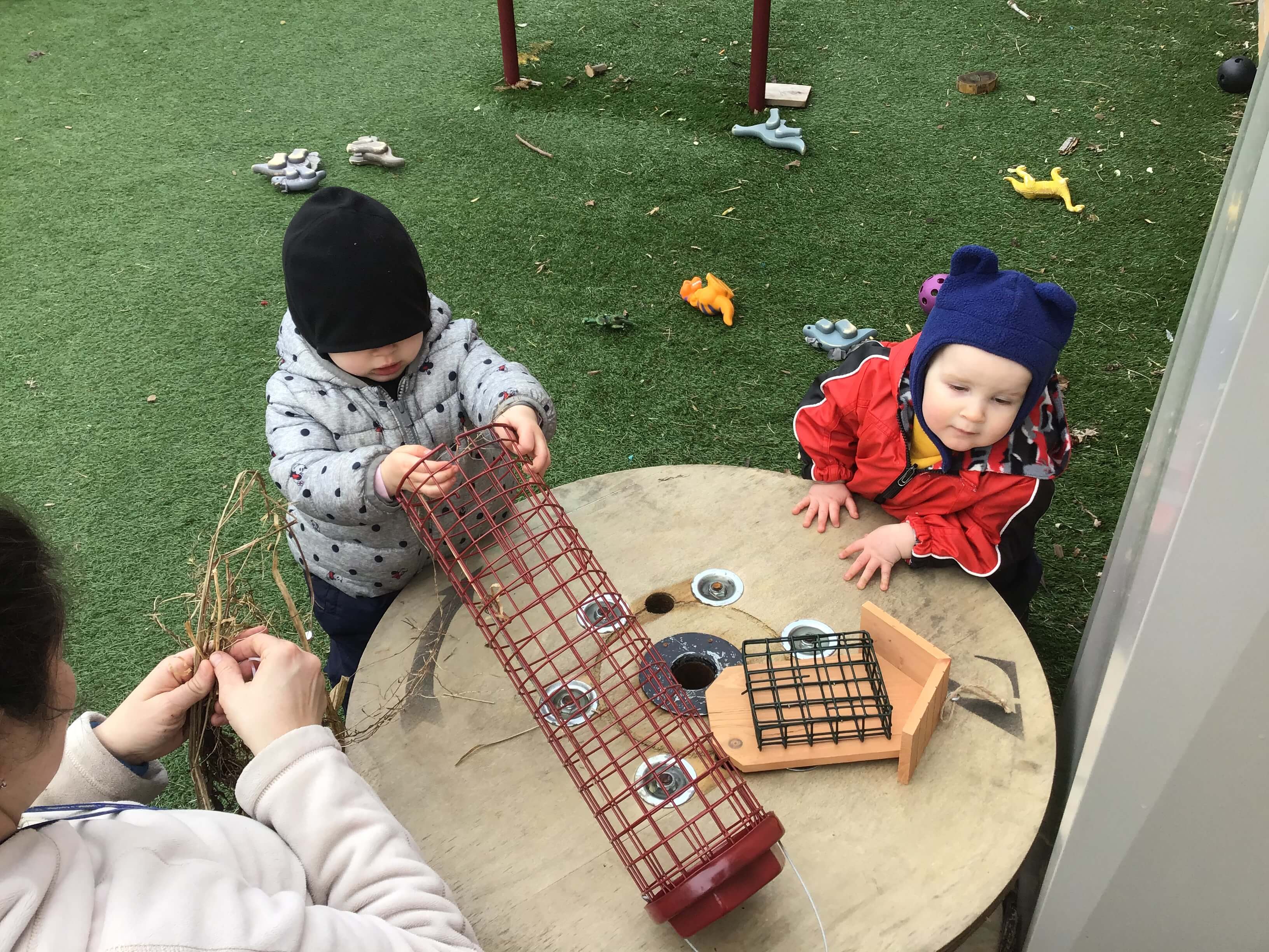 children making bird feeders