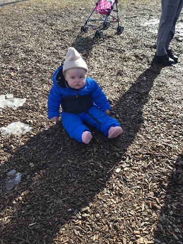A child sitting on the ground
